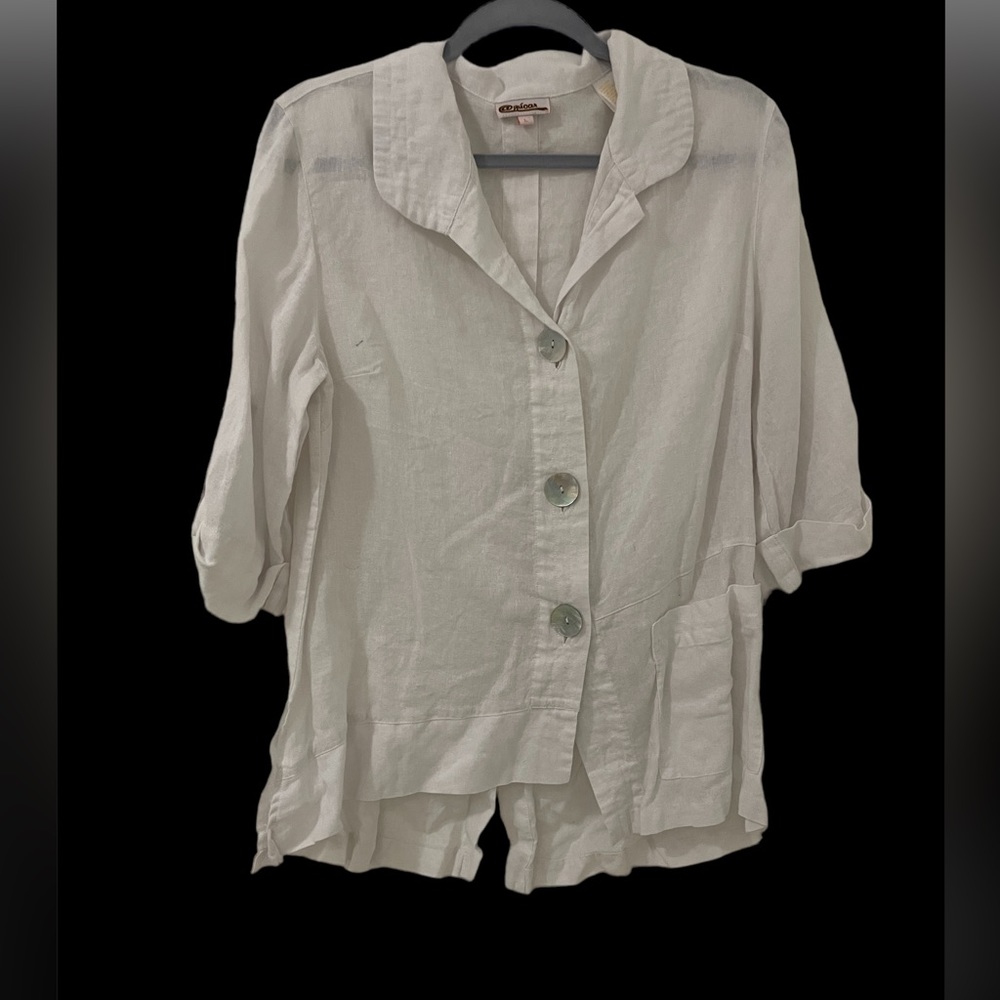 Azucar Assymetrical Guayabera Shirt in white linen big mother of pearl buttons.